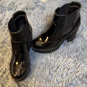 Sleek Black Patent Heeled Boots